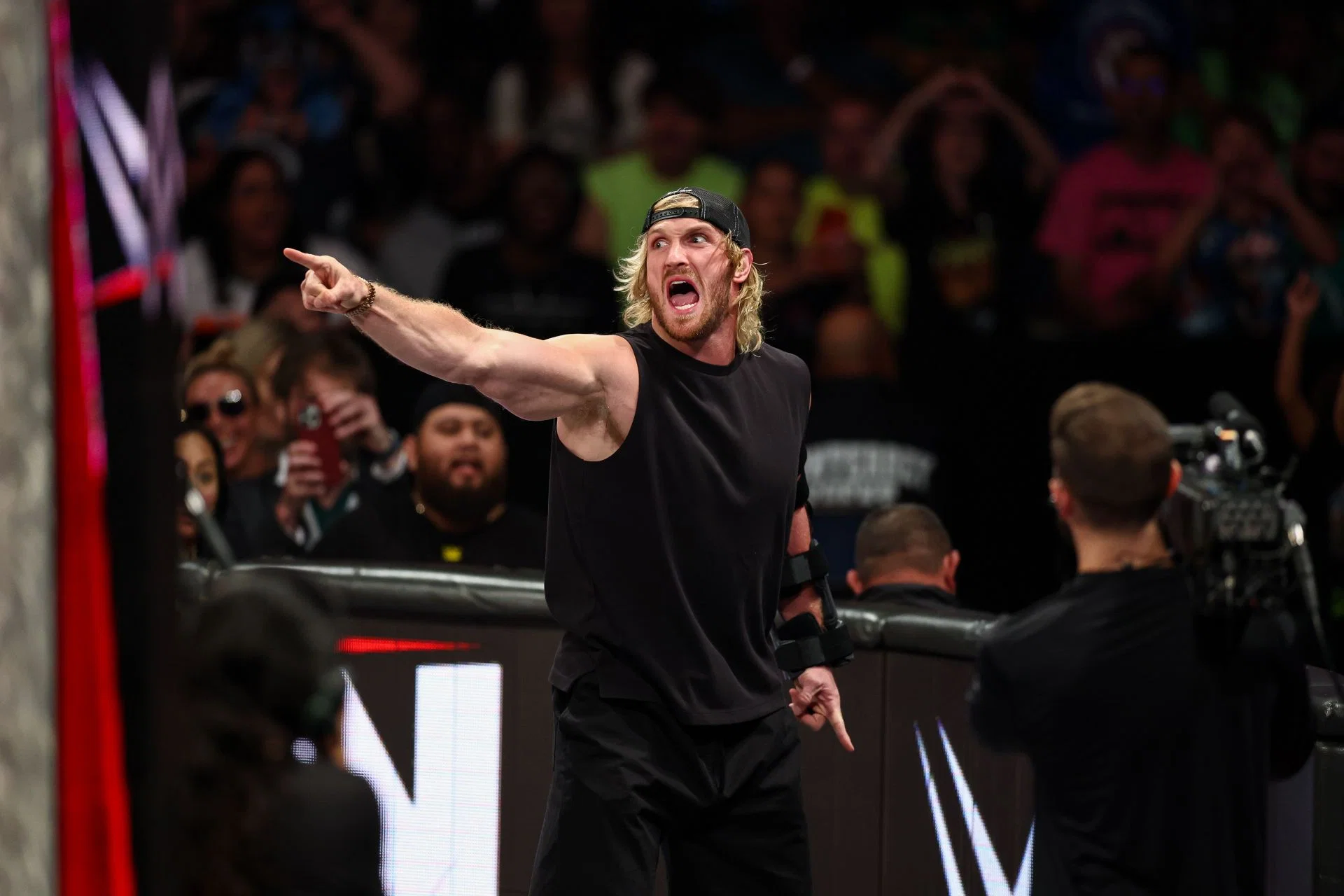 Logan Paul Apologizes to Triple H Over Hairstyle Struggle