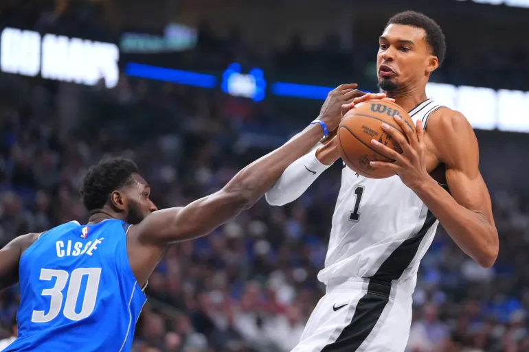 Wembanyama Leads Spurs Past Mavericks for First Win